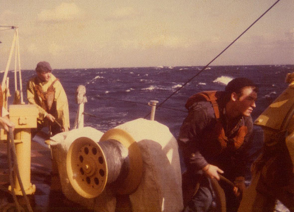 Ron Marlett lowering the USCGC Winnebago's small boat.