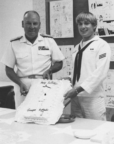 Admiral Prins and Ron Marlett celebrating Ron's cartoons.