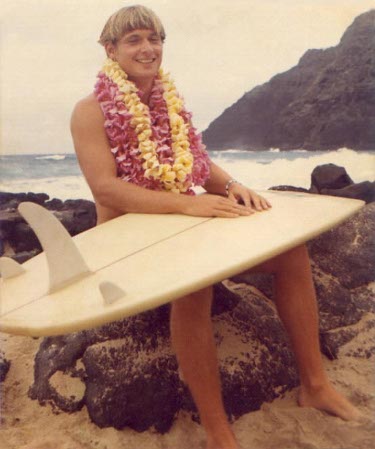 Ron Marlett with his surfboard in 1972.