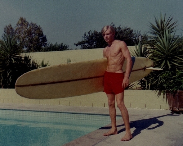 Ron Marlett with his surfboard in 1967.