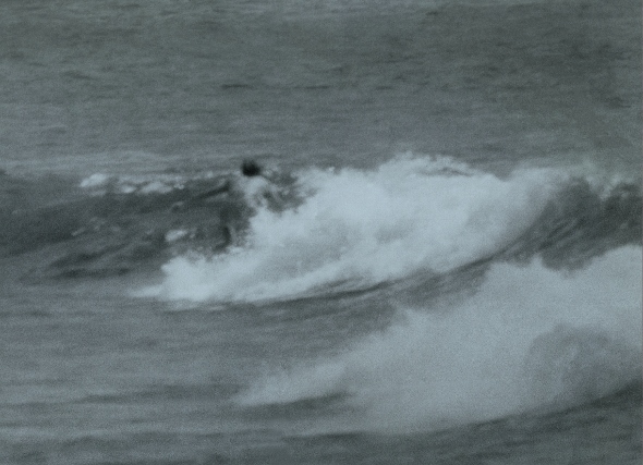 Ron Marlett surfing in Hawaii.