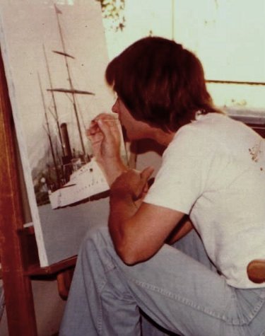 Ron Marlett working on a Coast Guard cutter painting.