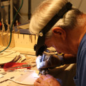 Ron Marlett working on the 1/84 scale HMS Victory.