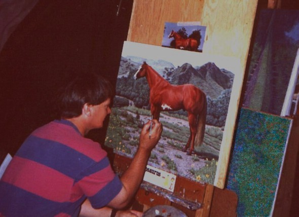 Ron Marlett working on a horse portrait.