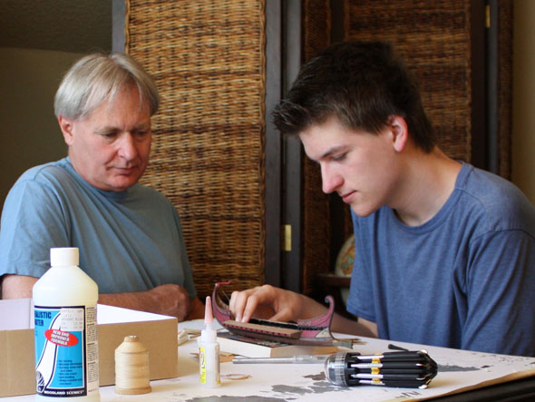 Ron Marlett's friend Anthony Mack photographing Ron's model ship.